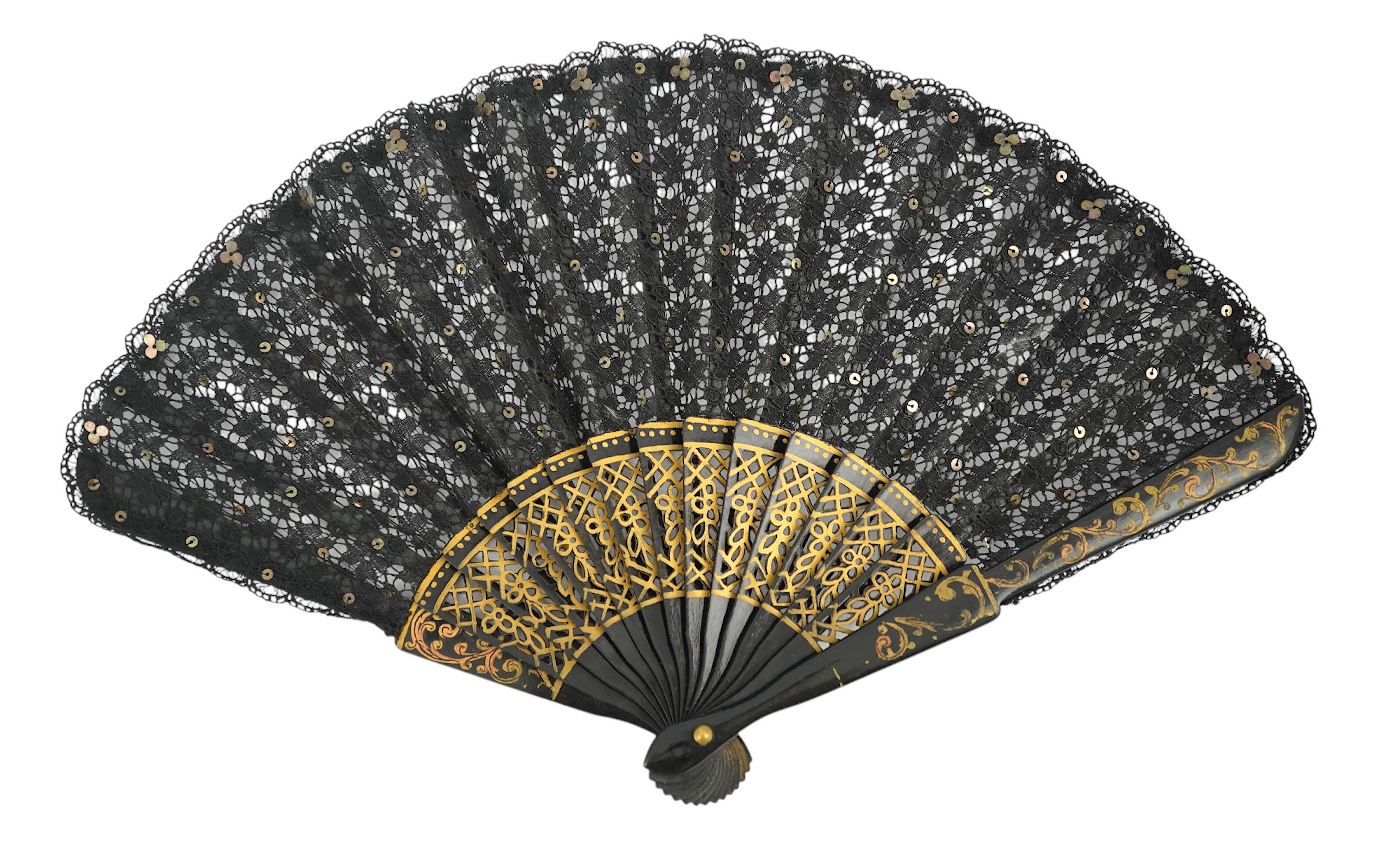 Three novelty fans with a mixed Brussels lace fan and black lace fan, a small language of love in flowers fan, a paper windmill advertising French Café fan, a carved cream Bakelite fan, a black and gilt, lace and sequin